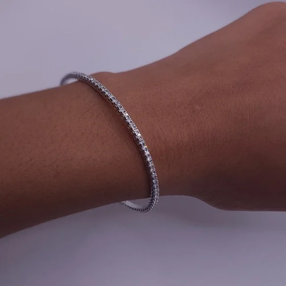 14 k w gold flexible bangle tennis bracelet w/over 3 carats of natural diamonds. - Picture 3 of 6